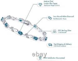 14K In White Gold Finish 6Ct Oval Cut London Blue Simulated Tennis Bracelet