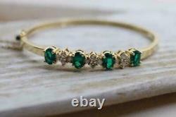4.00CT Oval Cut Simulated Emerald & Diamond 14K Yellow Gold Over Bangle Bracelet