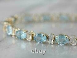 9Ct Oval Cut Aquamarine Women Lab Created Tennis Bracelet 14K Yellow Gold Finish