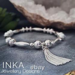 Inka Sterling Silver Chunky Oval bead Stacking Bracelet with Large Tassel charm