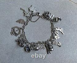 James Avery Sterling Silver. 925 Charm Bracelet 21 Charms Retired Pieces