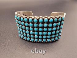 Navajo PAUL LIVINGSTON Sterling Silver cuff bracelet with 72 Turquoise stones