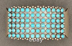 Navajo PAUL LIVINGSTON Sterling Silver cuff bracelet with 72 Turquoise stones