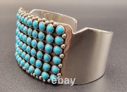 Navajo PAUL LIVINGSTON Sterling Silver cuff bracelet with 72 Turquoise stones