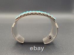 Navajo PAUL LIVINGSTON Sterling Silver cuff bracelet with 72 Turquoise stones