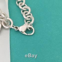 Please Return to Tiffany & Co Silver Round Tag Dangle Charm Bracelet