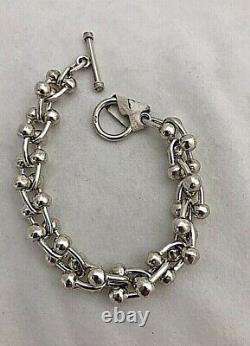 Sterling Silver. 925 1/2 x 8 1/4 kinda Dumbbell Bracelet