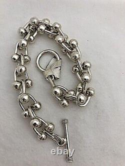 Sterling Silver. 925 1/2 x 8 1/4 kinda Dumbbell Bracelet