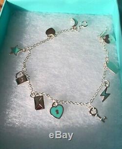 Tiffany & Co Dangle charm bracelet heart lock star blue enamel 6.75'' mini