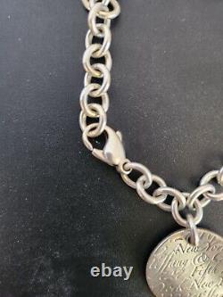 Tiffany & Co Sterling Silver Chain Wavy Notes Fifth Avenue Round Tag Bracelet