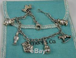 Tiffany & Co Vintage Sterling Silver Dog Cat Teddy Clown Horse 7 Charm Bracelet