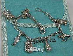 Tiffany & Co Vintage Sterling Silver Dog Cat Teddy Clown Horse 7 Charm Bracelet