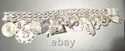 Vintage 1970's Sterling Silver Charm Bracelet 16 Sterling Silver Charms 90 Grams