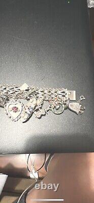 Vintage 1970's Sterling Silver Charm Bracelet 16 Sterling Silver Charms 90 Grams