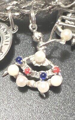 Vintage 1970's Sterling Silver Charm Bracelet 16 Sterling Silver Charms 90 Grams