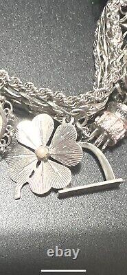 Vintage 1970's Sterling Silver Charm Bracelet 16 Sterling Silver Charms 90 Grams
