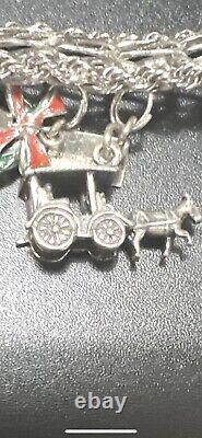 Vintage 1970's Sterling Silver Charm Bracelet 16 Sterling Silver Charms 90 Grams