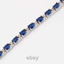 White Gold Plated 6.48 Simulated Tanzanite Woman's Tennis Bracelet 925 Silver