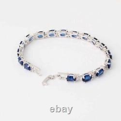 White Gold Plated 6.48 Simulated Tanzanite Woman's Tennis Bracelet 925 Silver